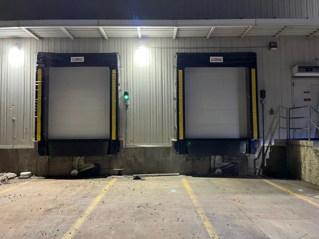 two white dock stations garage doors