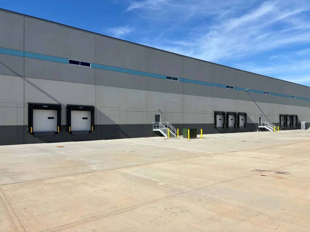 industrial dock installation with white garage doors