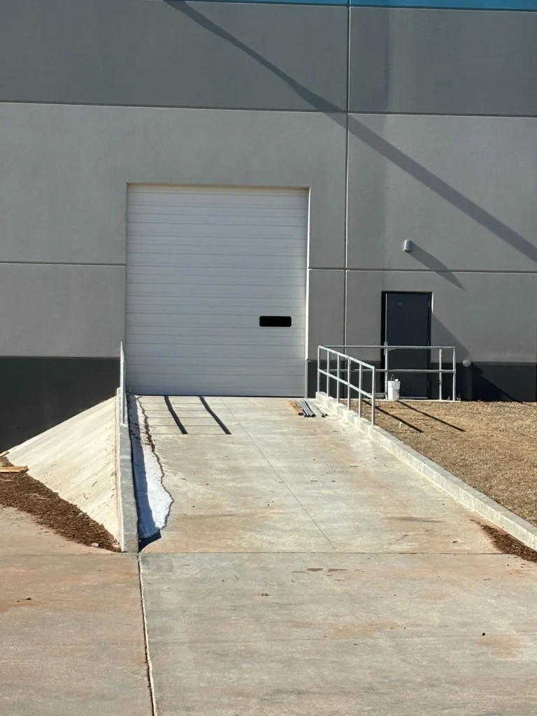 white industrial garage door - commercial overhead door services near you